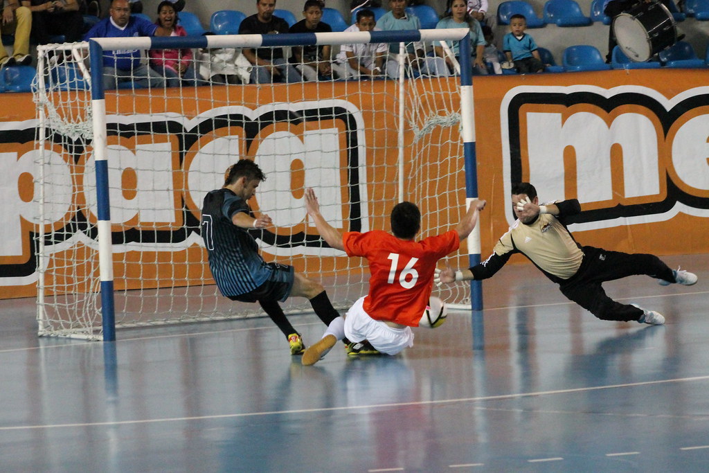 futsal players at the goal