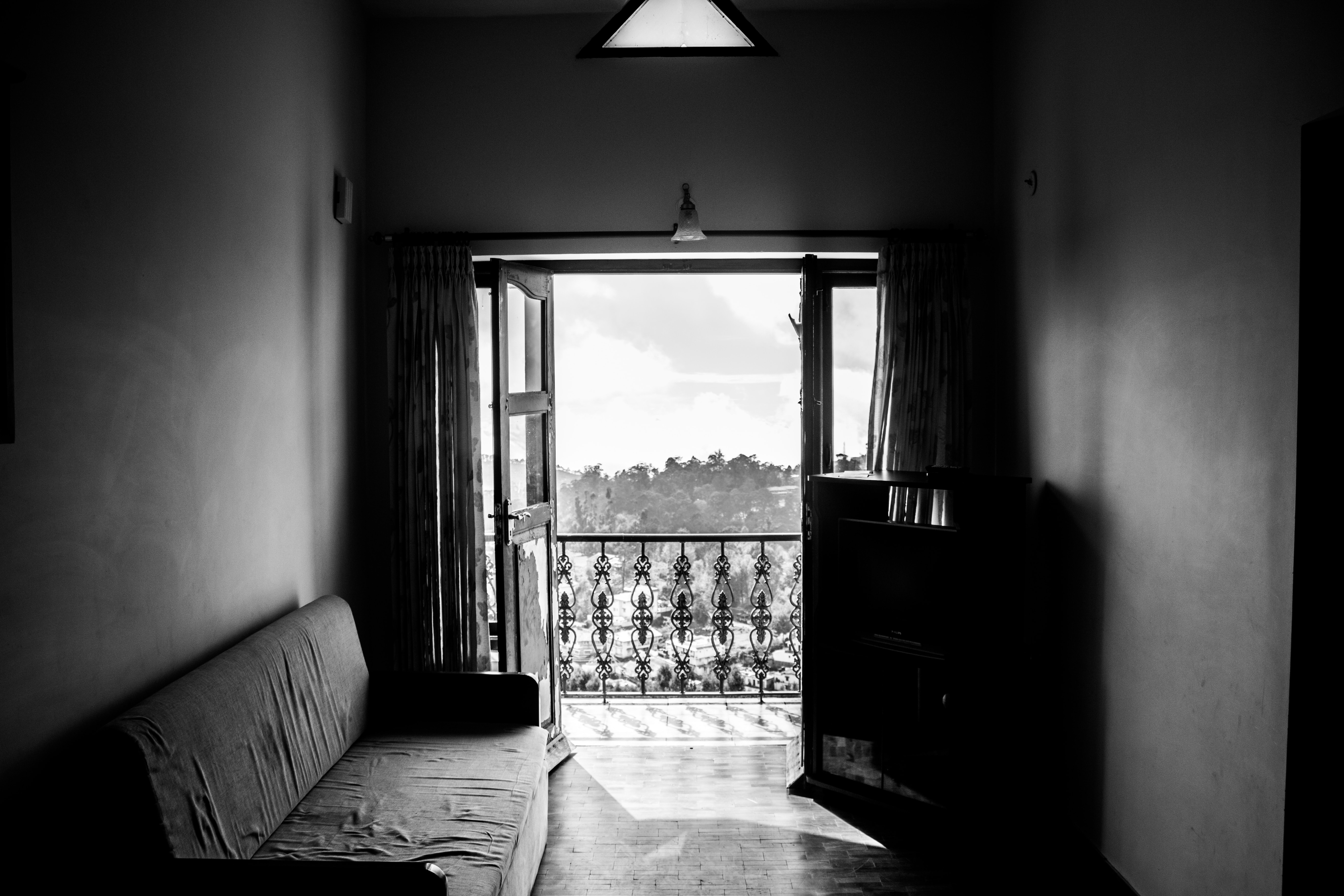 Living alone. Image credit: Unsplash by Kevin Fernandez.