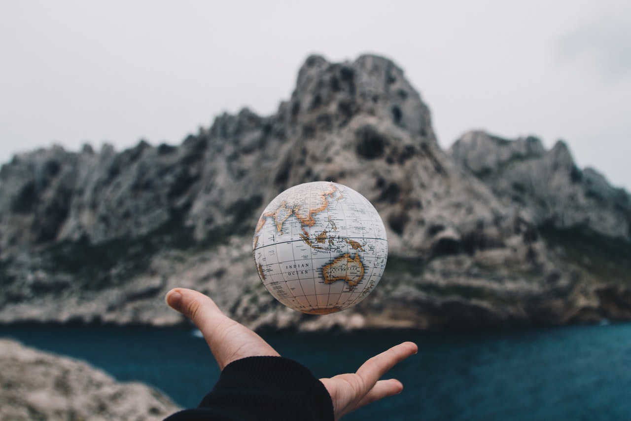 Antonucci, Valentin, Person tossing globe, https://www.pexels.com/photo/person-tossing-globe-1275393/