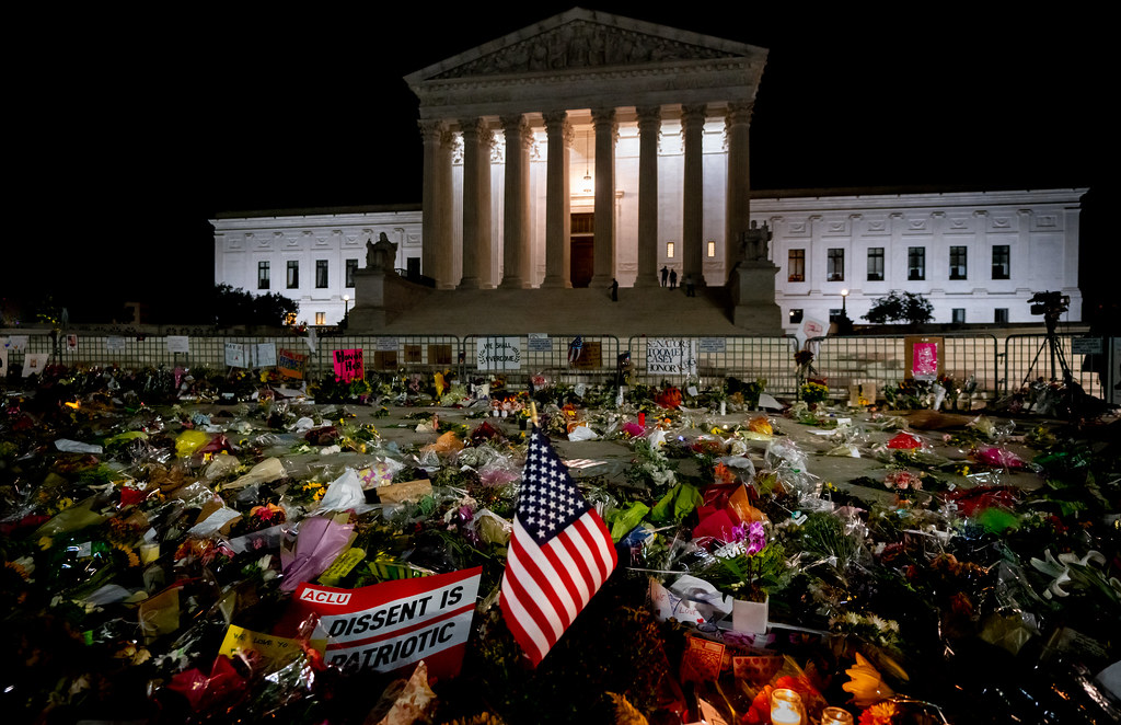 An outpouring of sympathies for the late Ruth Bader Ginsberg in front of the Supreme Court. Image Credit: Flickr/vpickering