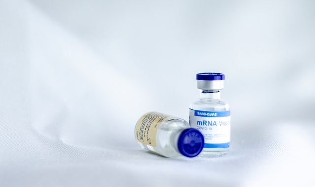two vials of COVID vaccine