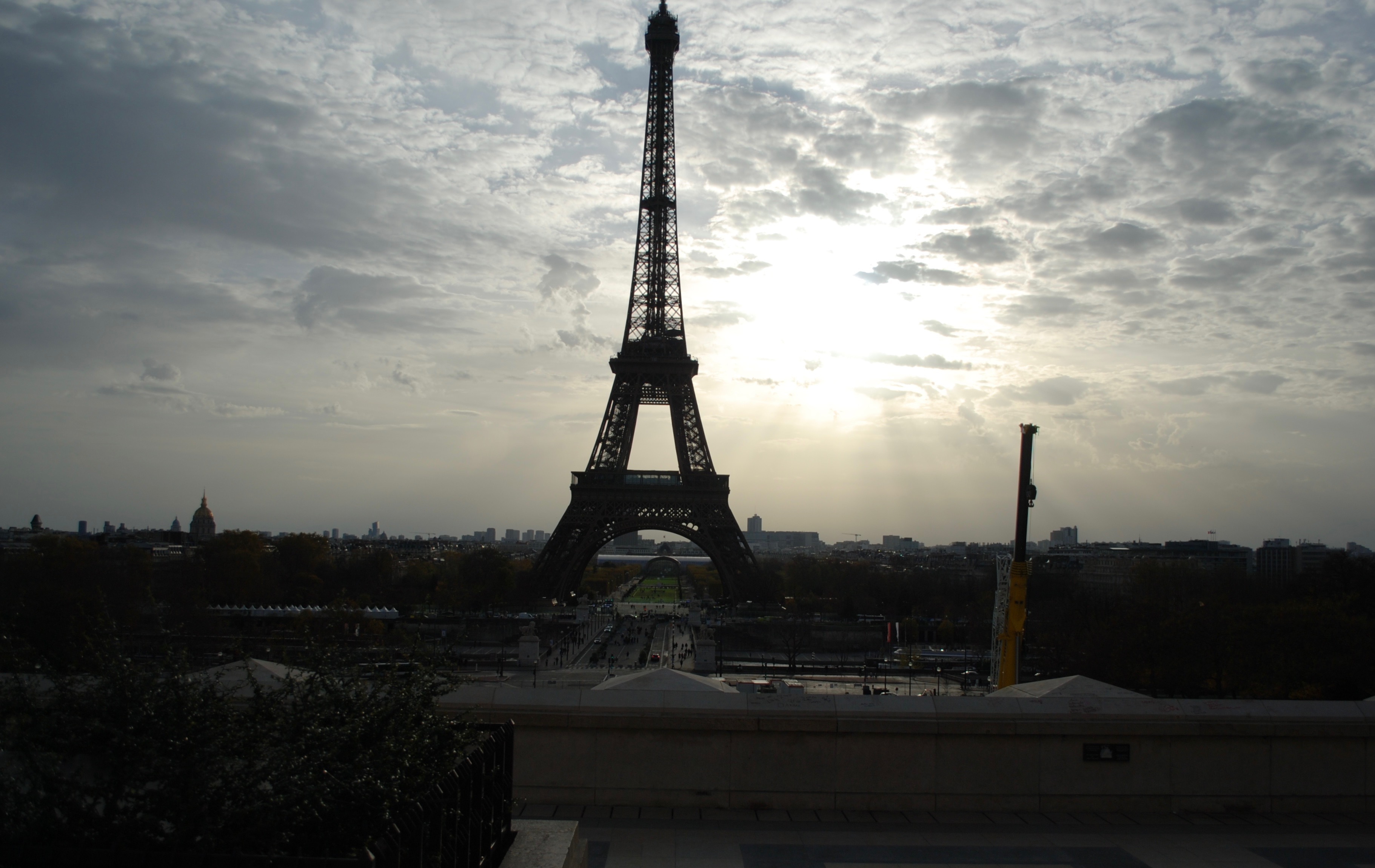 Photo of gloomy Parisian sky featuring The Eiffel Tower in Paris, France.