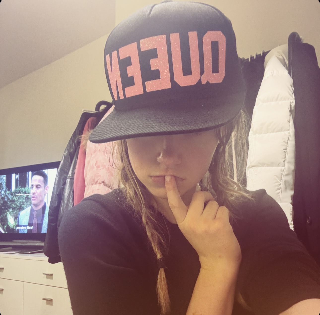 A queen flatback hat with filter overtop of selfies/image credit: Ryan Garvey