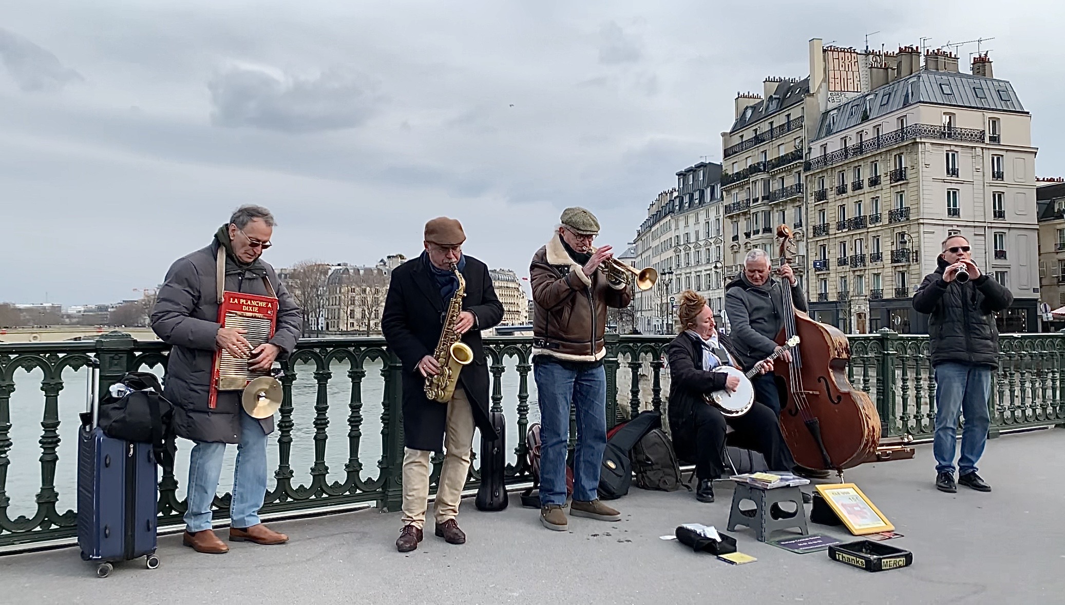 Ruby Hishmeh. "Jazz Band on Pont au Change." Personal photograph, 15 Mar 2025..