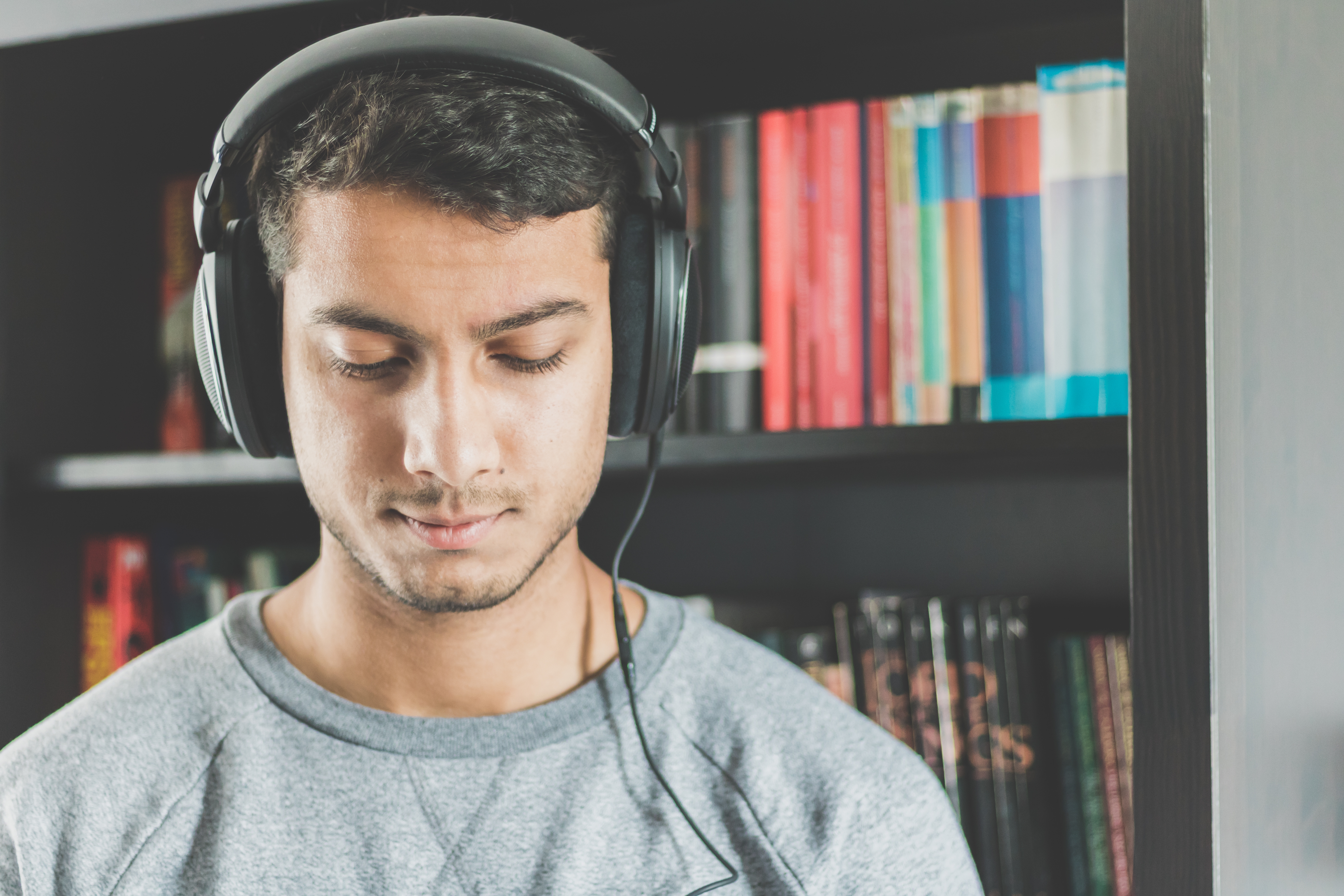 Man with headphones, Image Credit:Reshot / Minesh Patel 