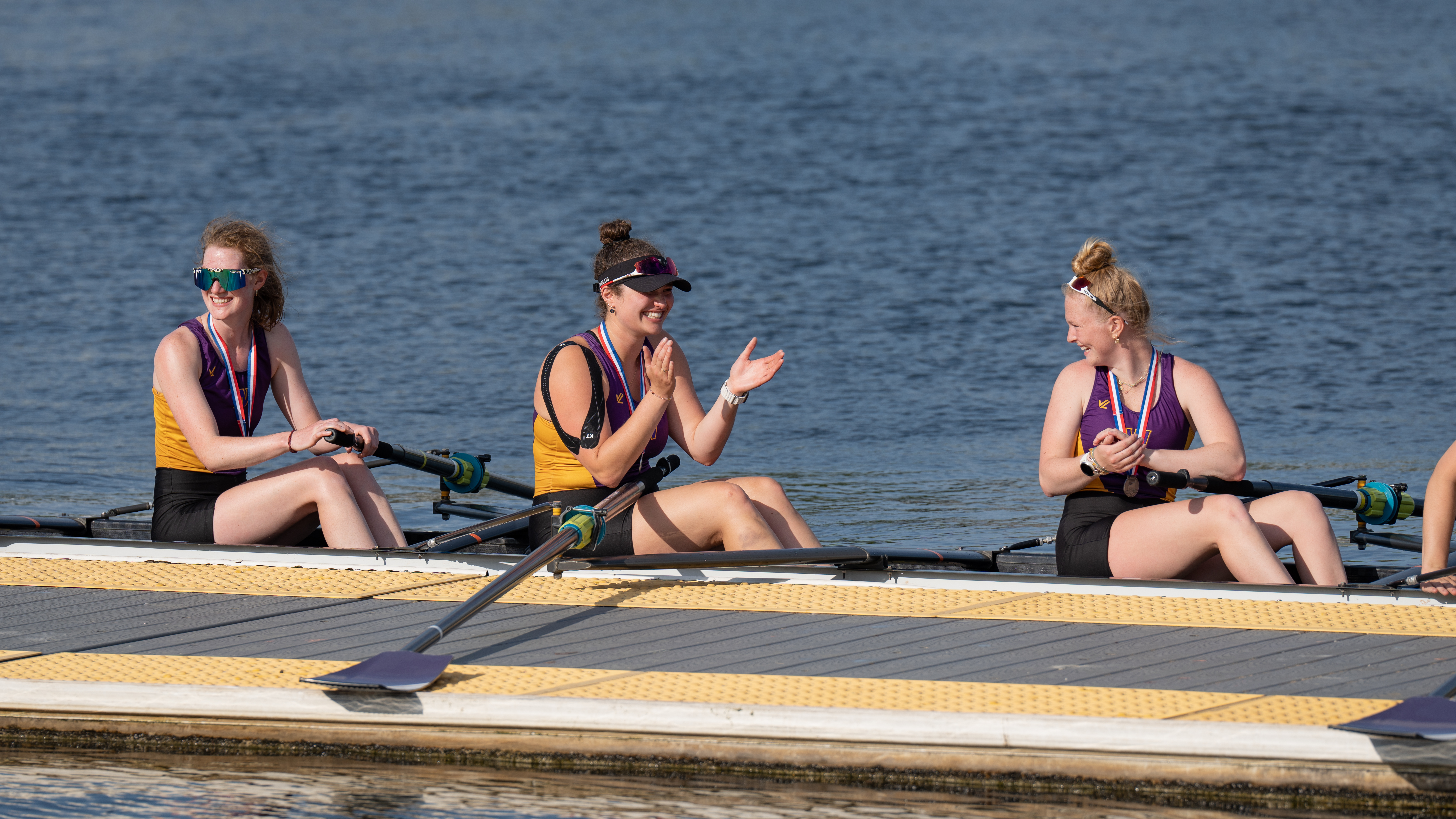 Rowers cheering in the boat
