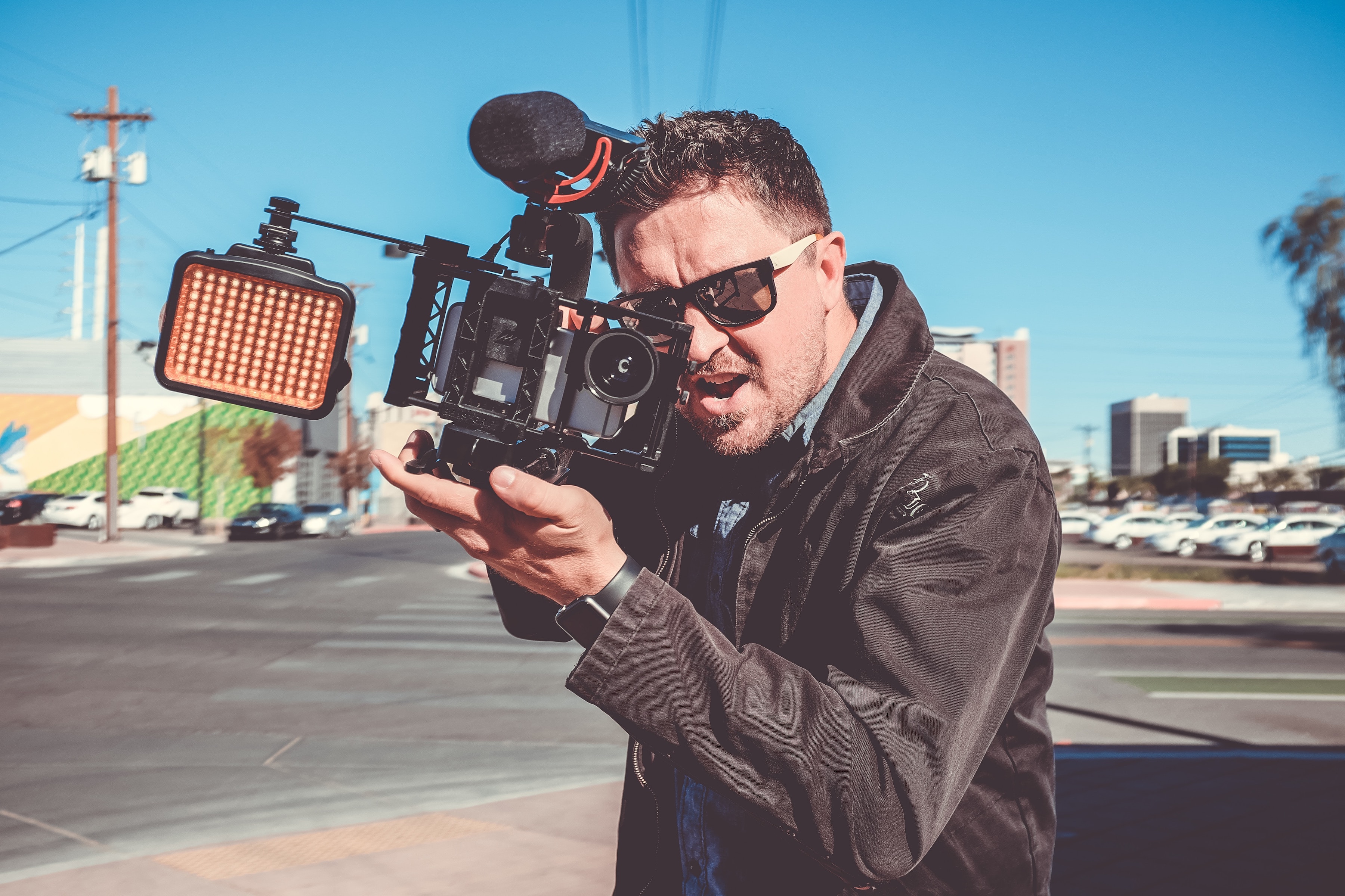 Man filming, Image Credit: NeONBRAND on Unsplash