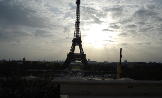 Photo of gloomy Parisian sky featuring The Eiffel Tower in Paris, France.