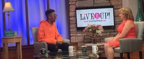 Stylist Chris Banks interviews with talk show host Donna Drake