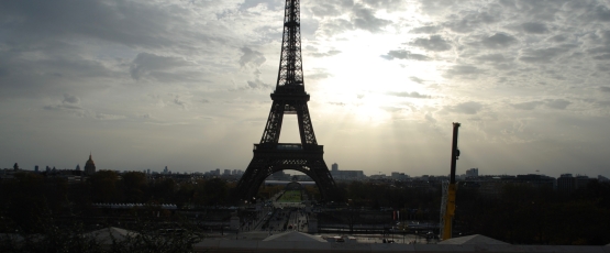 Photo of gloomy Parisian sky featuring The Eiffel Tower in Paris, France.