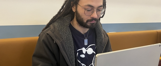Eli researching quantum computing.
