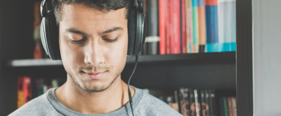 Man with headphones, Image Credit:Reshot / Minesh Patel 