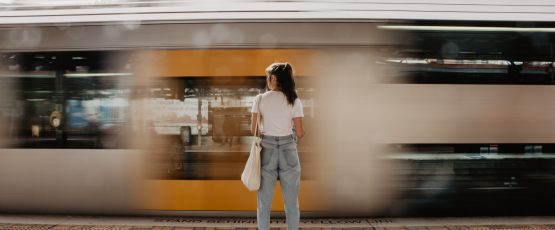 Girl in front of train