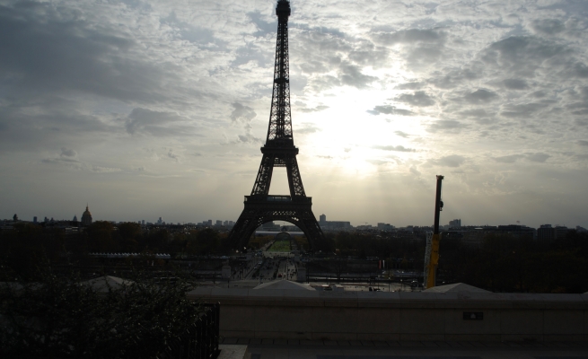 Photo of gloomy Parisian sky featuring The Eiffel Tower in Paris, France.