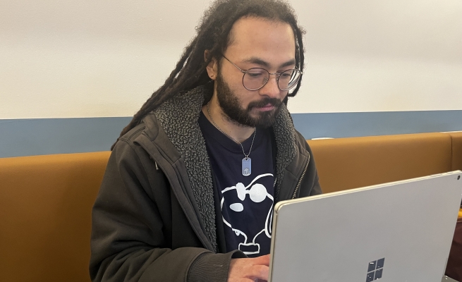 Eli researching quantum computing.