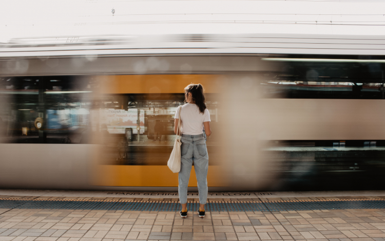 Girl in front of train
