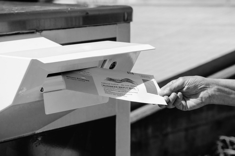 A vote being mailed in. Image Credit: Flickr/ShebleyCL